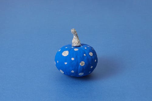 Blue and Silver Pumpkin on Blue Background