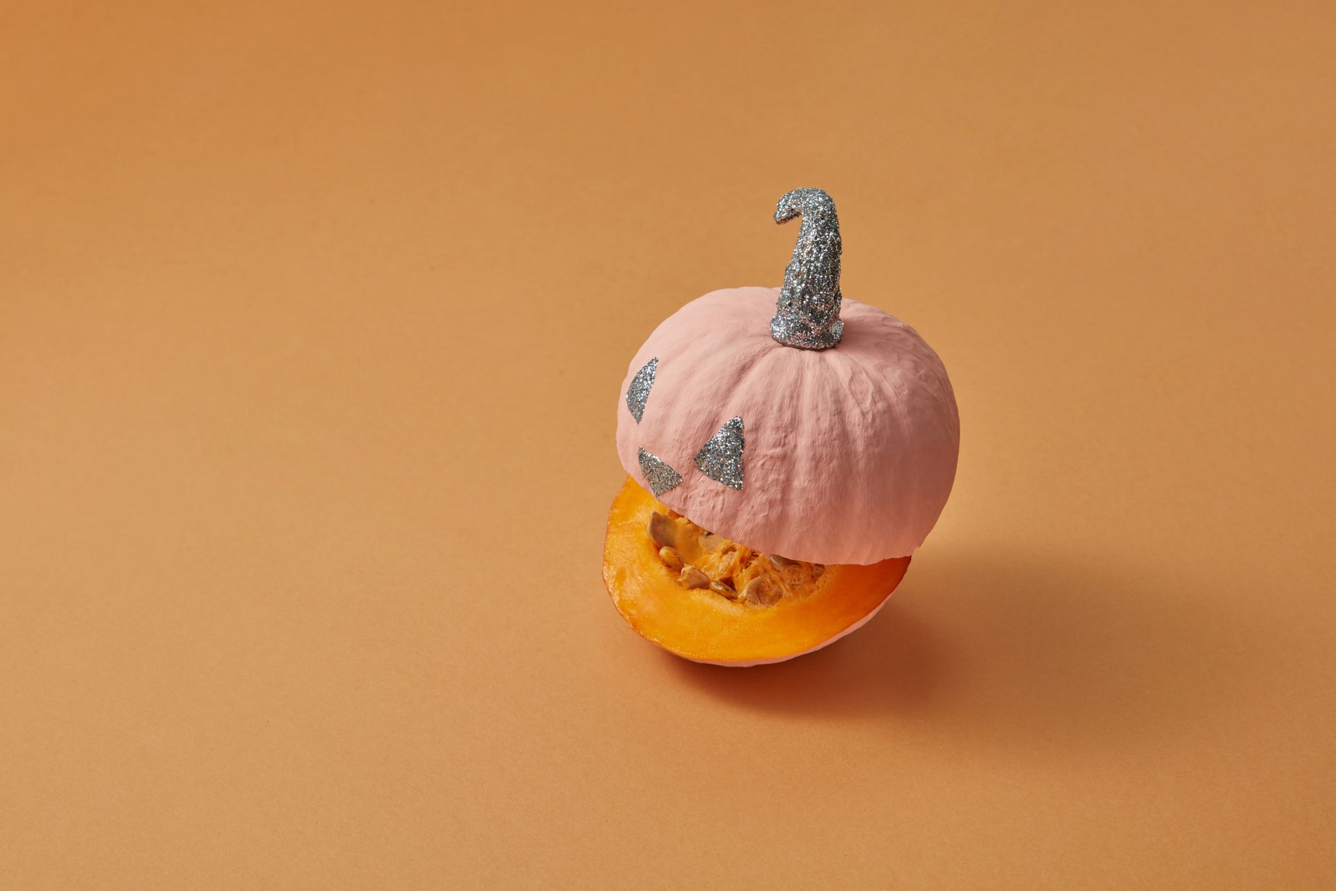Mini Pumpkin with a Glittery Jack O Lantern Design