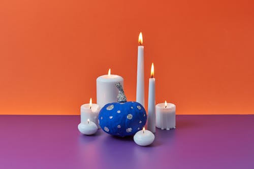 Blue and Silver Mini Pumpkin and White Burning Candles