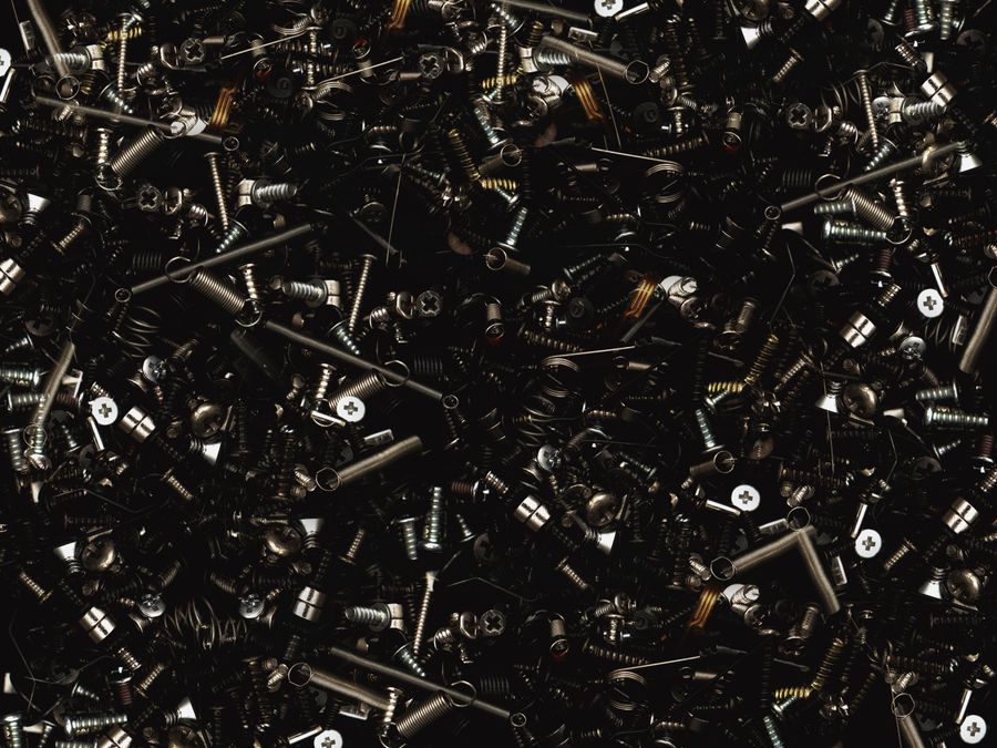 Fastener coverage with assorted screws and bolts