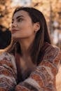 Woman in Brown and White Floral Shirt