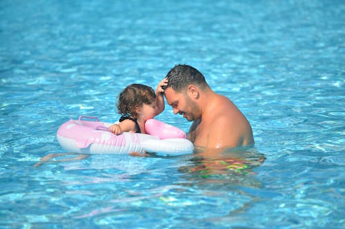 Father and Daughter in the Swimming Pool