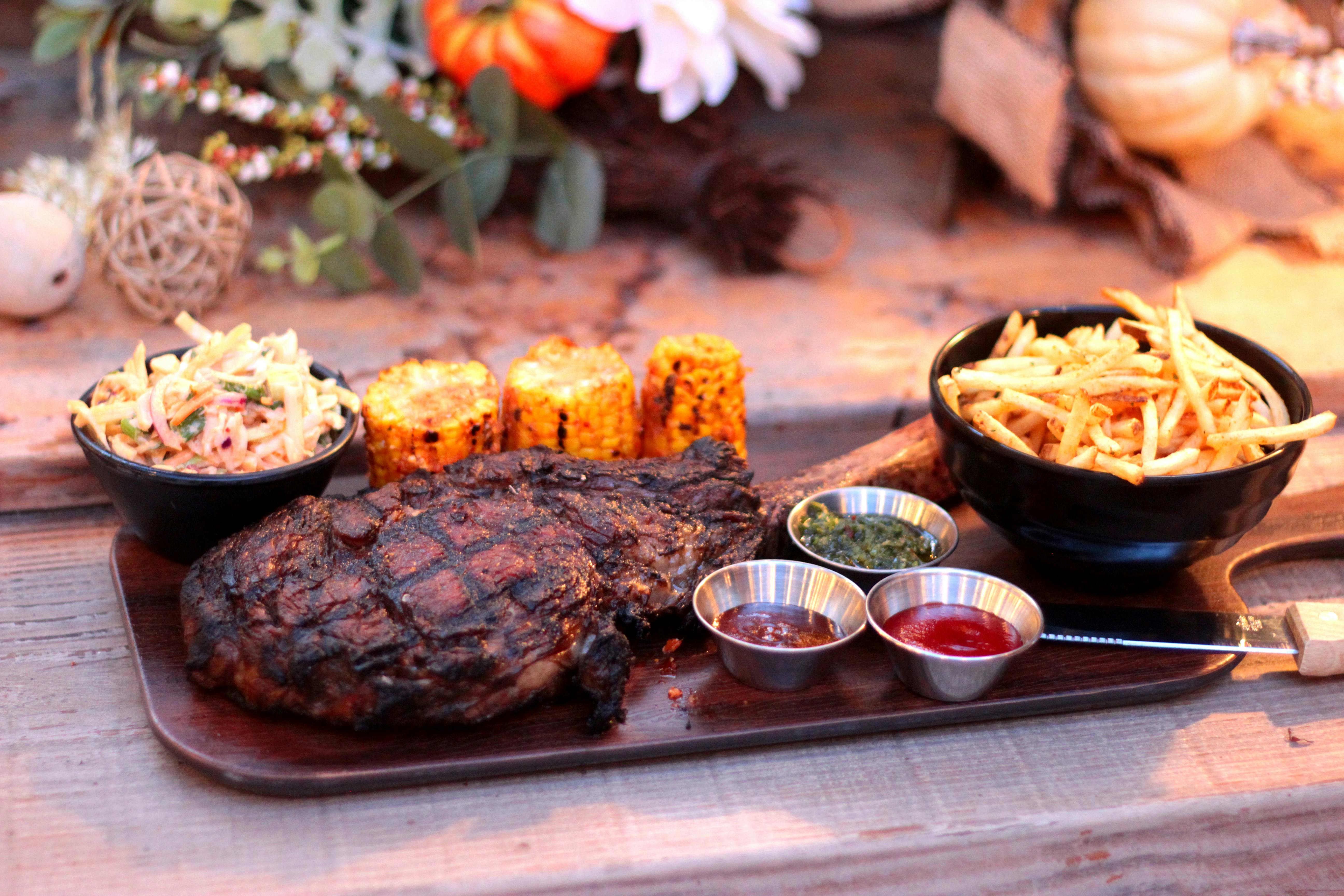 grilled meat on wooden plate