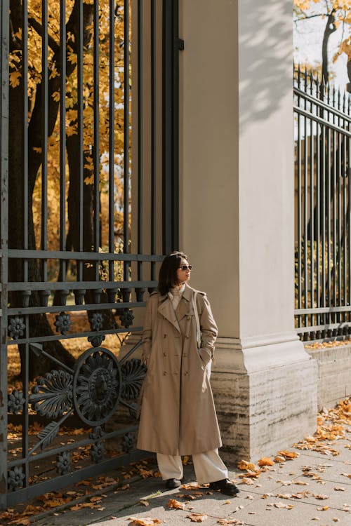 A Woman Wearing a Long Trench Coat