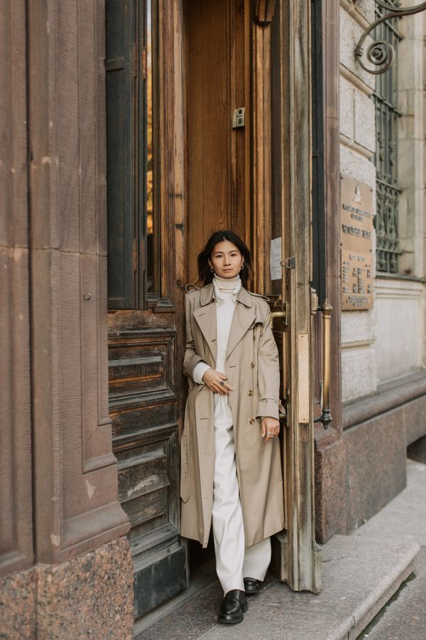 Woman in classic trench coat