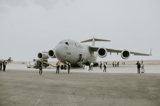 An RCAF para-rescue operations team deploying to a simulated maritime emergency.