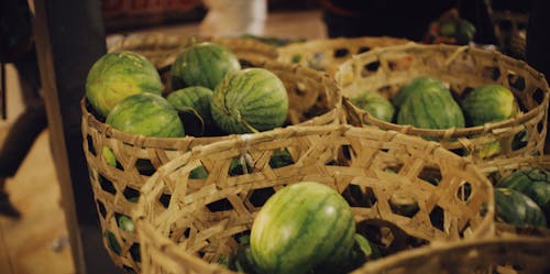 Watermelons in Brown Woven Baskets