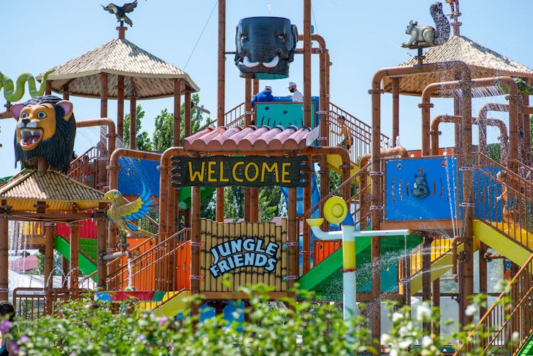 People Enjoying The Water Park