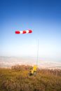 Lifeguards Chair and Windsock on a Hill