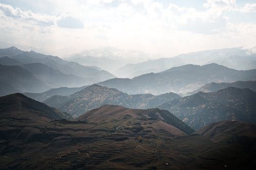 Mountains Under White Sky