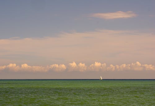 Photograph of Clouds Near the Sea