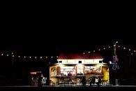 People Walking on Street during Night Time