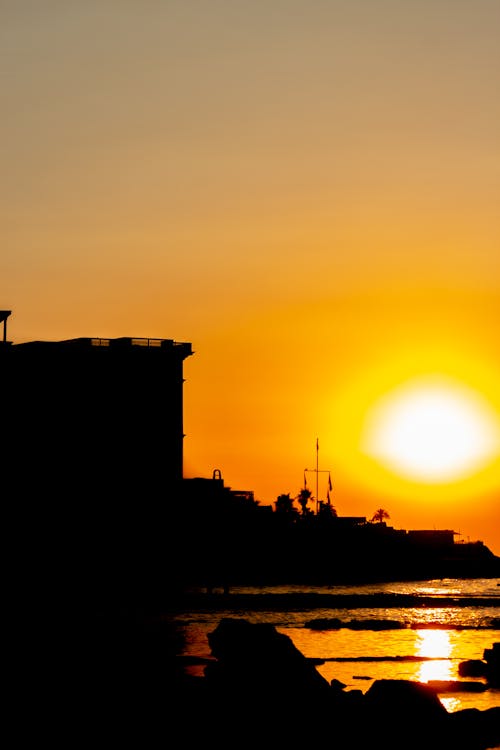 Sunset in Golden Sky Seen From Beach