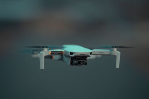 Free Close-up view of a modern drone in flight, showcasing technology and innovation. Stock Photo