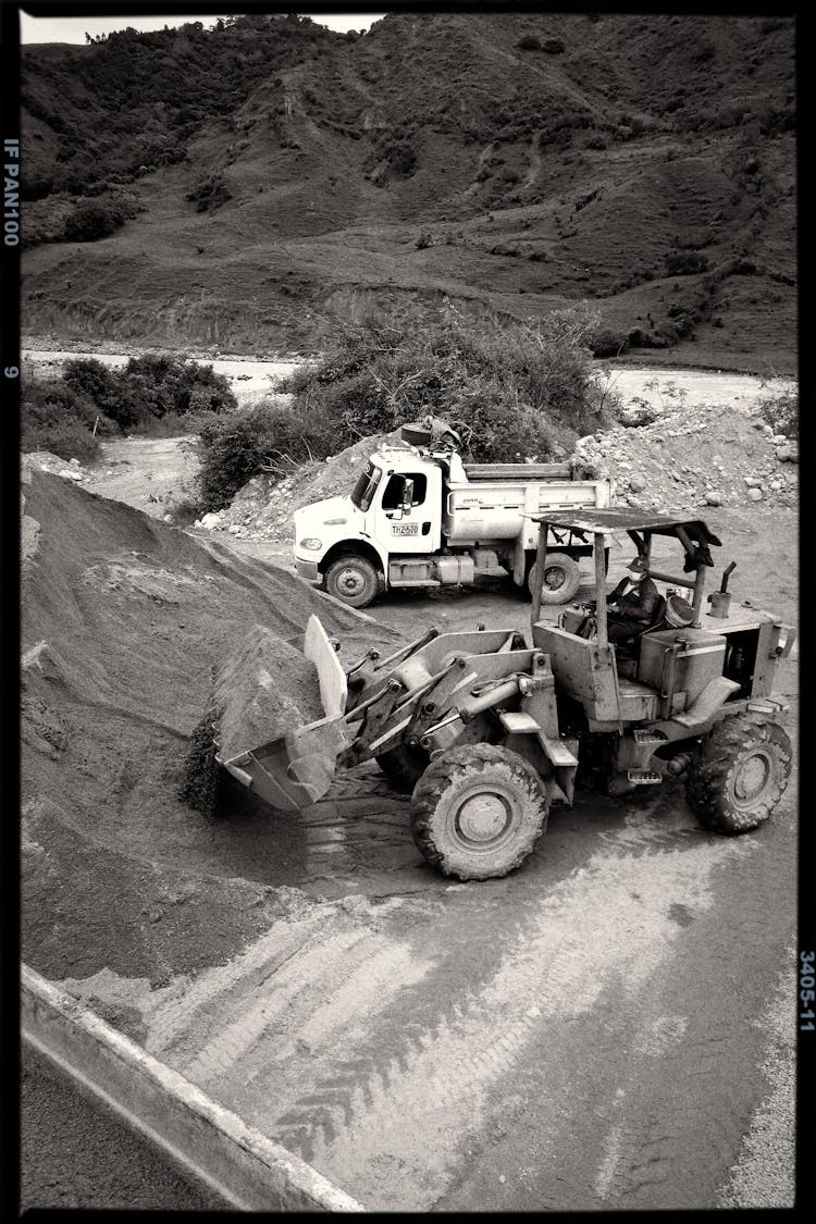 Black And White View Of Digger On Construction