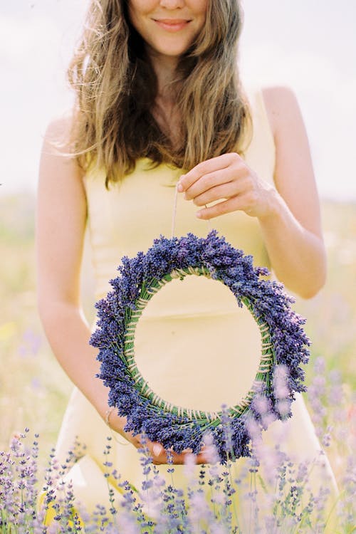 Free Woman Holding Lavender Flower Crown  Stock Photo