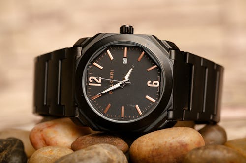 Free Black Wristwatch on Stones Stock Photo