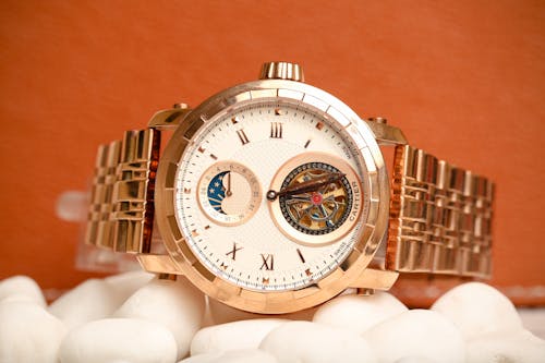 Cartier Brand Watch with Astrological Symbols and Copper Gold Bracelet