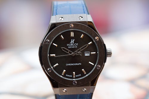 Black Analog Wristwatch with Blue Leather Belt