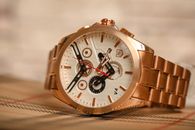Gold Wristwatch in Close Up Photography