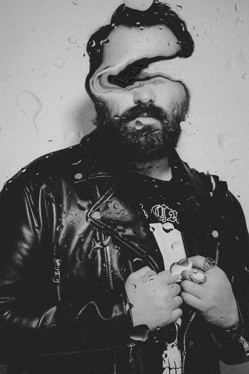 Bearded Man in Black Leather Jacket