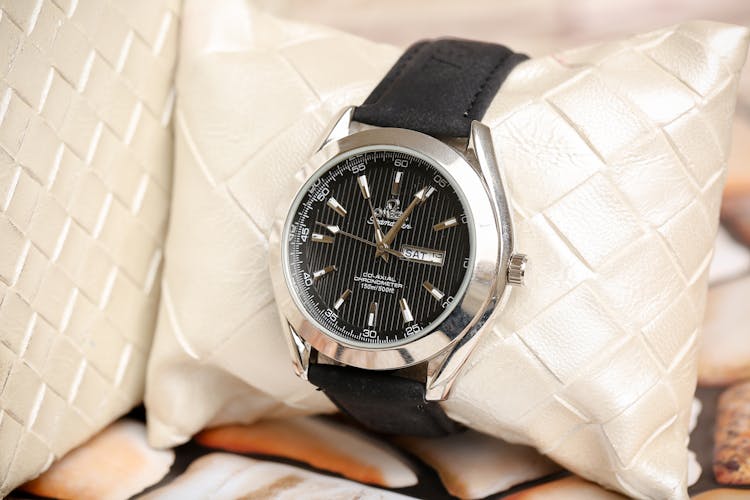 Black Omega Analog Watch In Close-Up Photography 