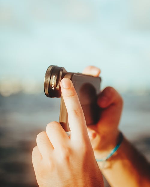 Kostnadsfri bild av fotograf, fotografi, händer mänskliga händer