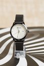Watch Against Striped Background