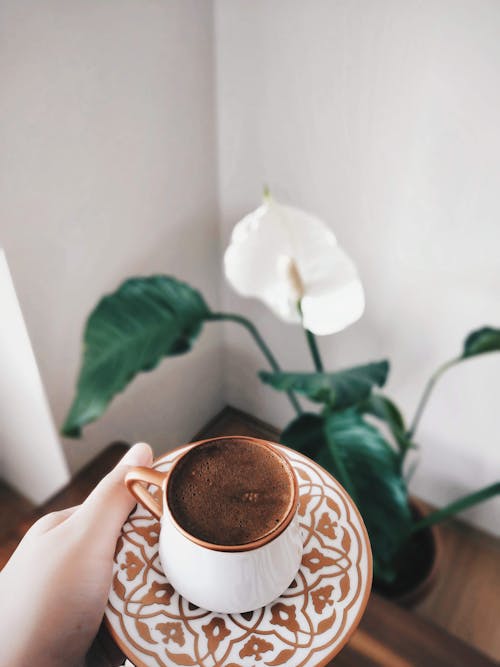 Coffee on a Ceramic Cup and Saucer