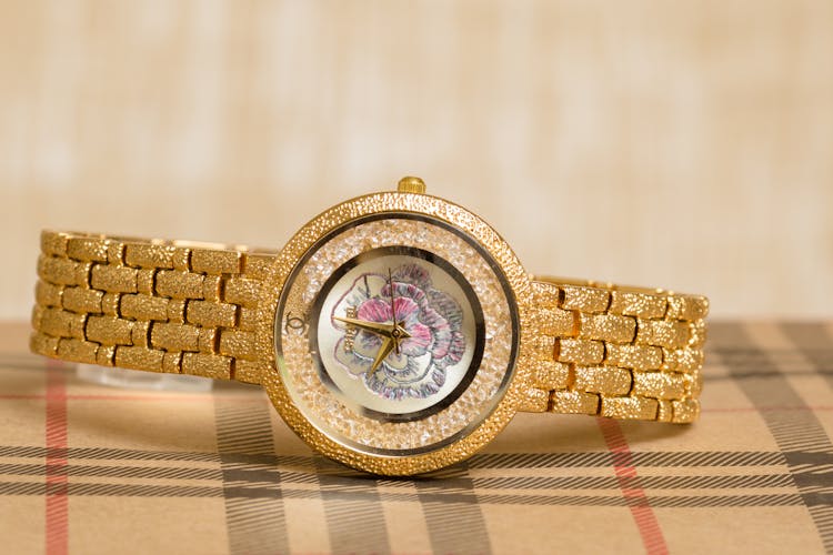 Floral Design On A Gold Wristwatch