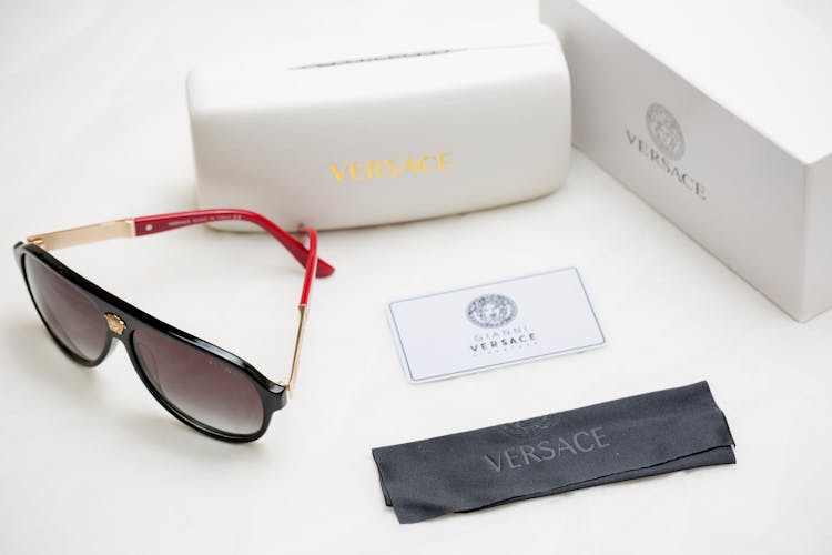 Luxury Sunglasses With Package On White Background