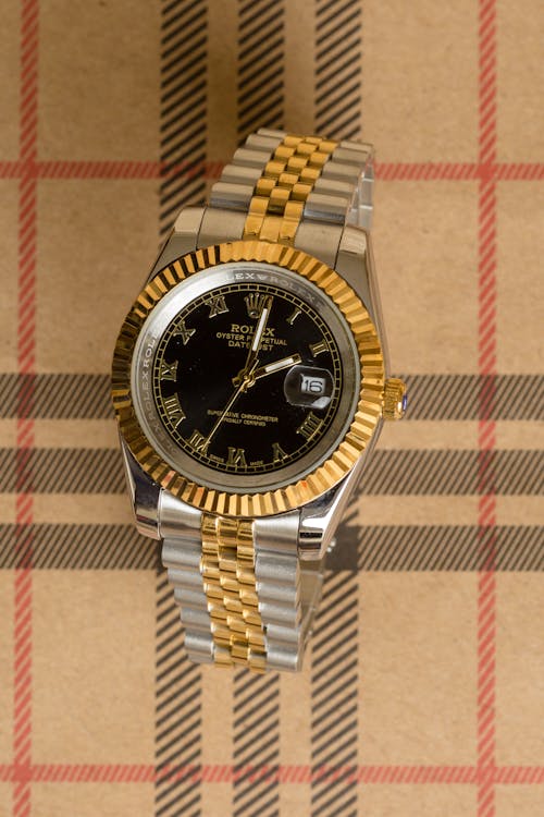 Free Silver and Gold Wristwatch Stock Photo