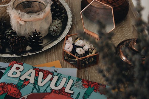 Decorations, Candles and Magazines on a Table 