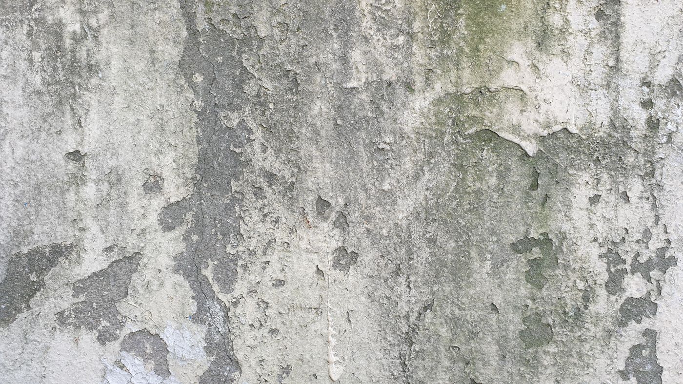 Existing masonry foundation showing cracking and movement