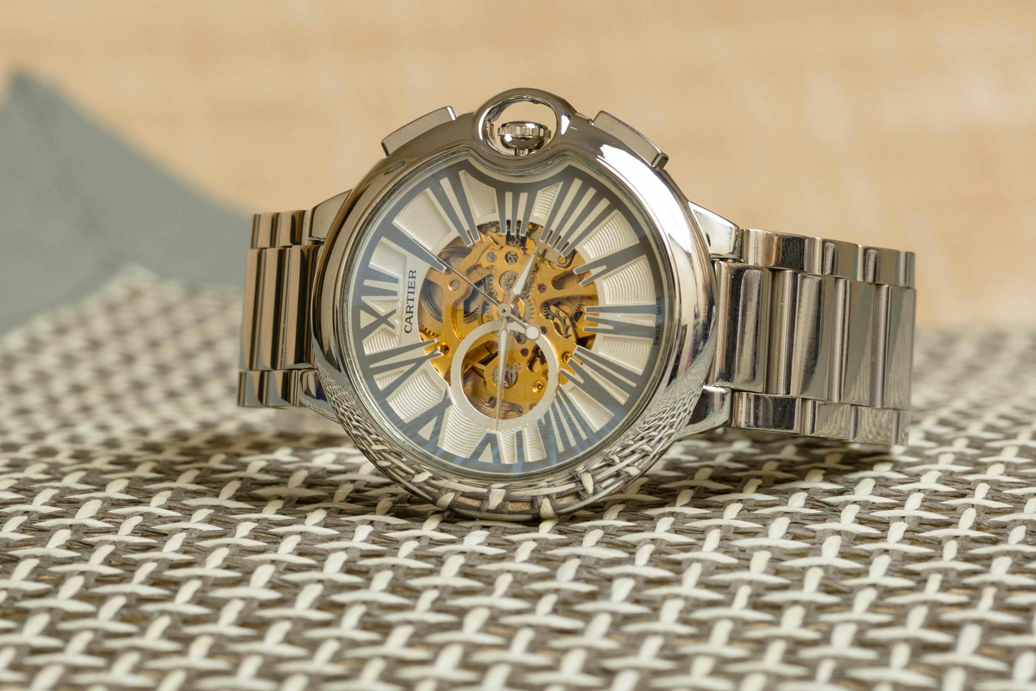 Louis Vuitton Gold and Silver Analog Watch · Free Stock Photo