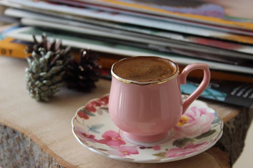 White and Pink Ceramic Cup