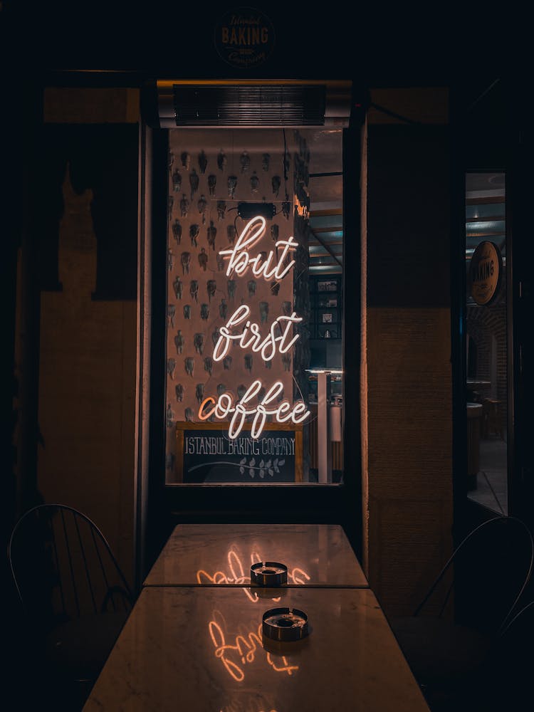 Dark Bar Interior With Neon Script