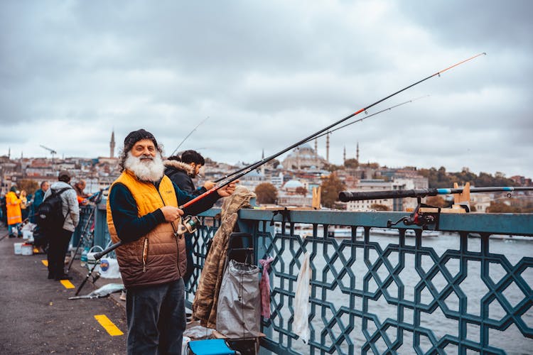 Angler Fishing On Bridge 