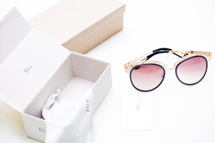 Boxes, Cloth And Sunglasses Of Dior