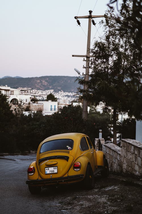 бесплатная Бесплатное стоковое фото с автомобиль, вид сзади, желтый Стоковое фото