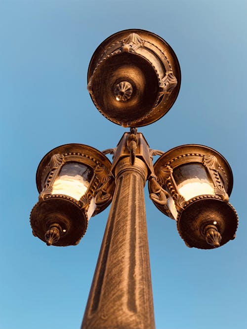 Free Blue Sky over a Lamppost Stock Photo