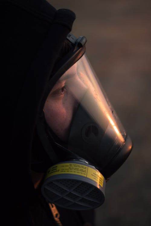 Person Wearing a Full Face Gas Mask