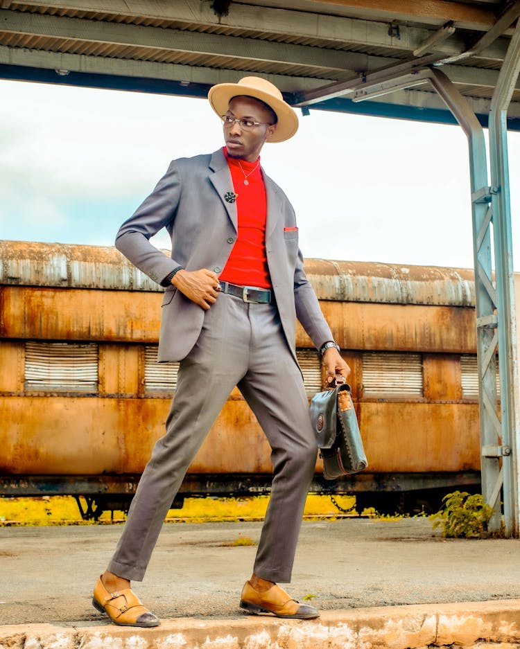 Man In Suit On Train Station