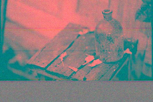 Glass Bottle on Table