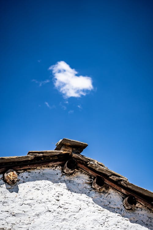 Brown Concrete Building Under Blue Sky