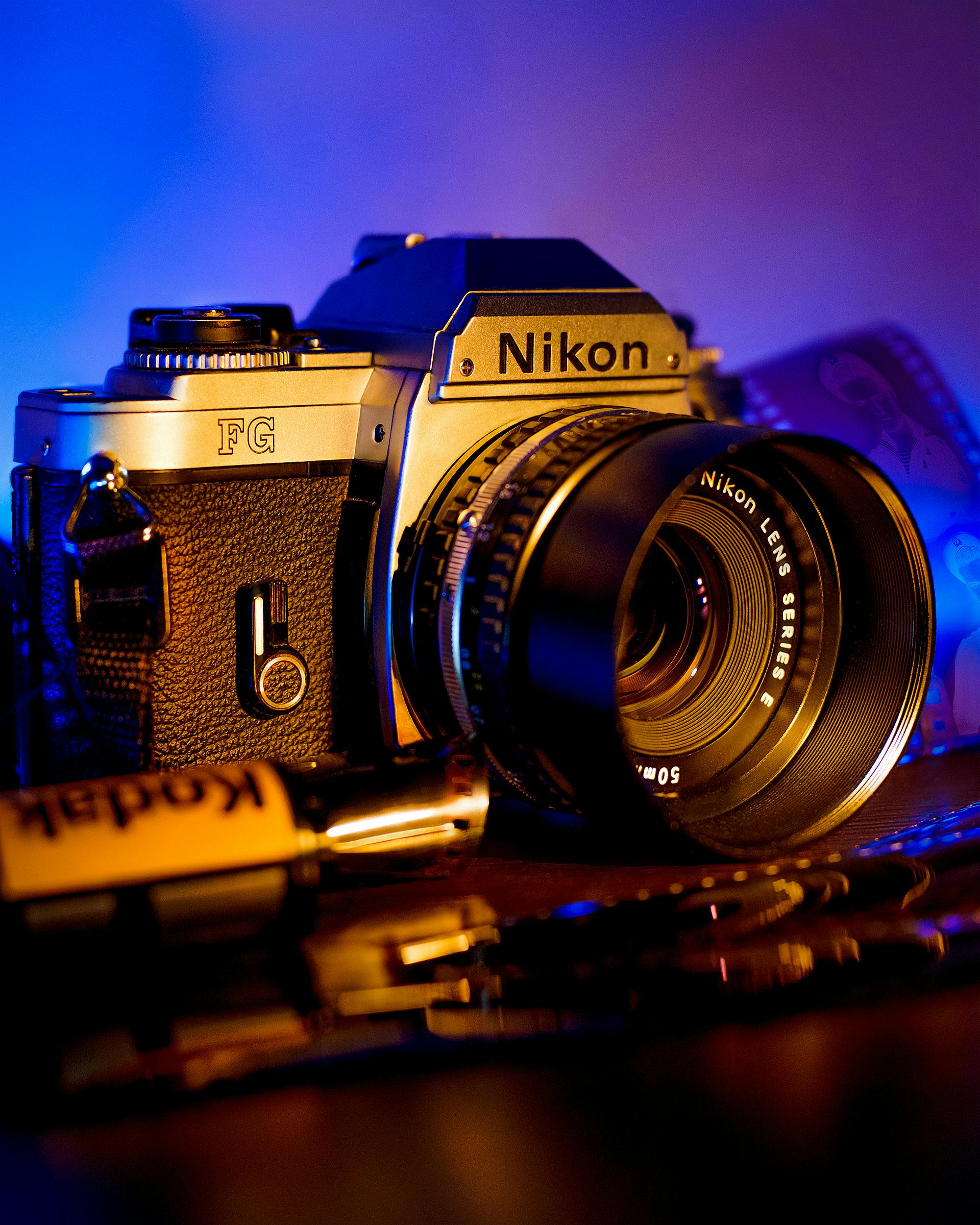 Black and Silver Nikon Dslr Camera in Close-Up Photography Black and Silver Nikon Dslr Camera in Close-Up Photography