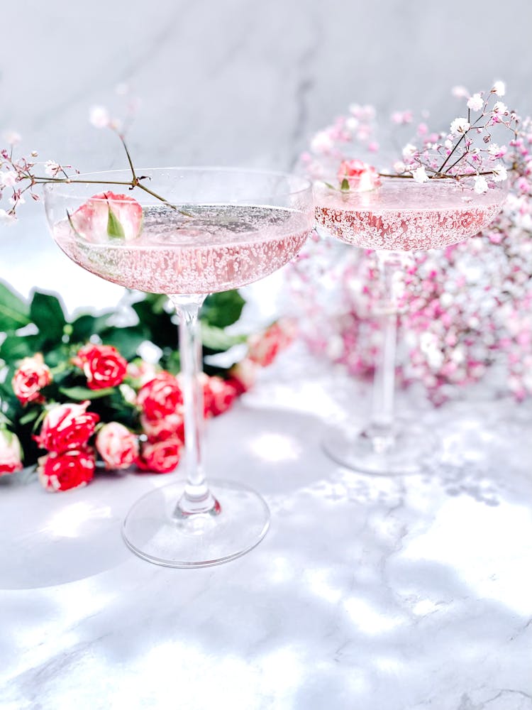 Glasses Of Champagne With Floral Decorations