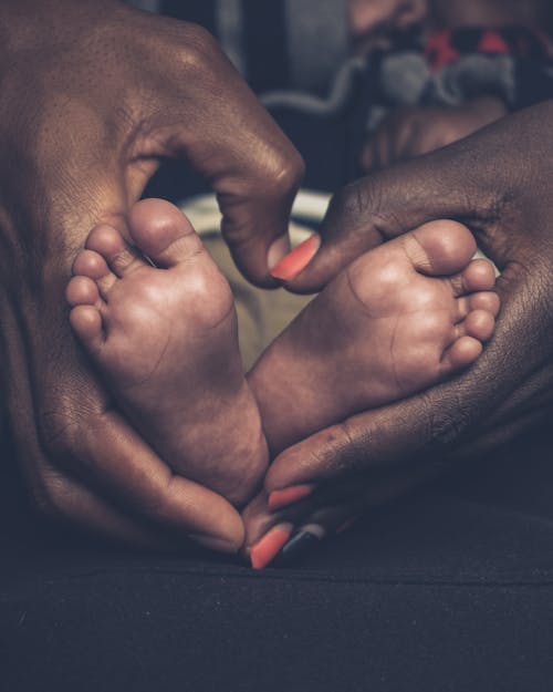 Free stock photo of african baby, baby feet, child Stock Photo