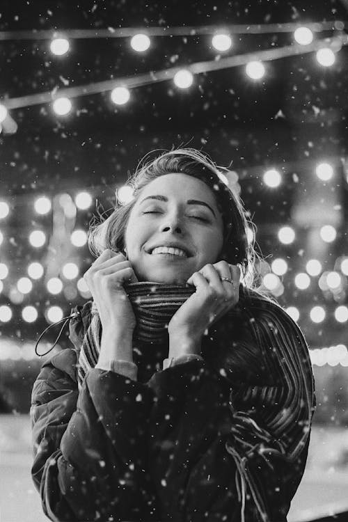 Woman Enjoying Snowy Winter