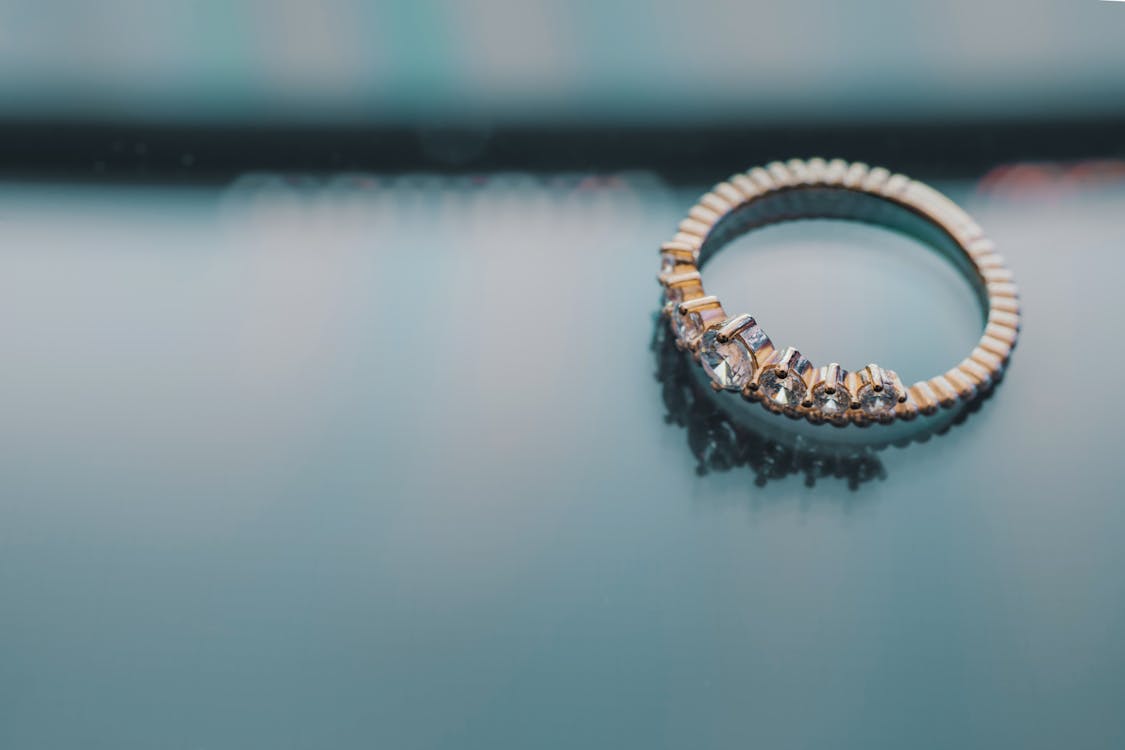 Free Gold-colored Diamond Engagement Ring Stock Photo